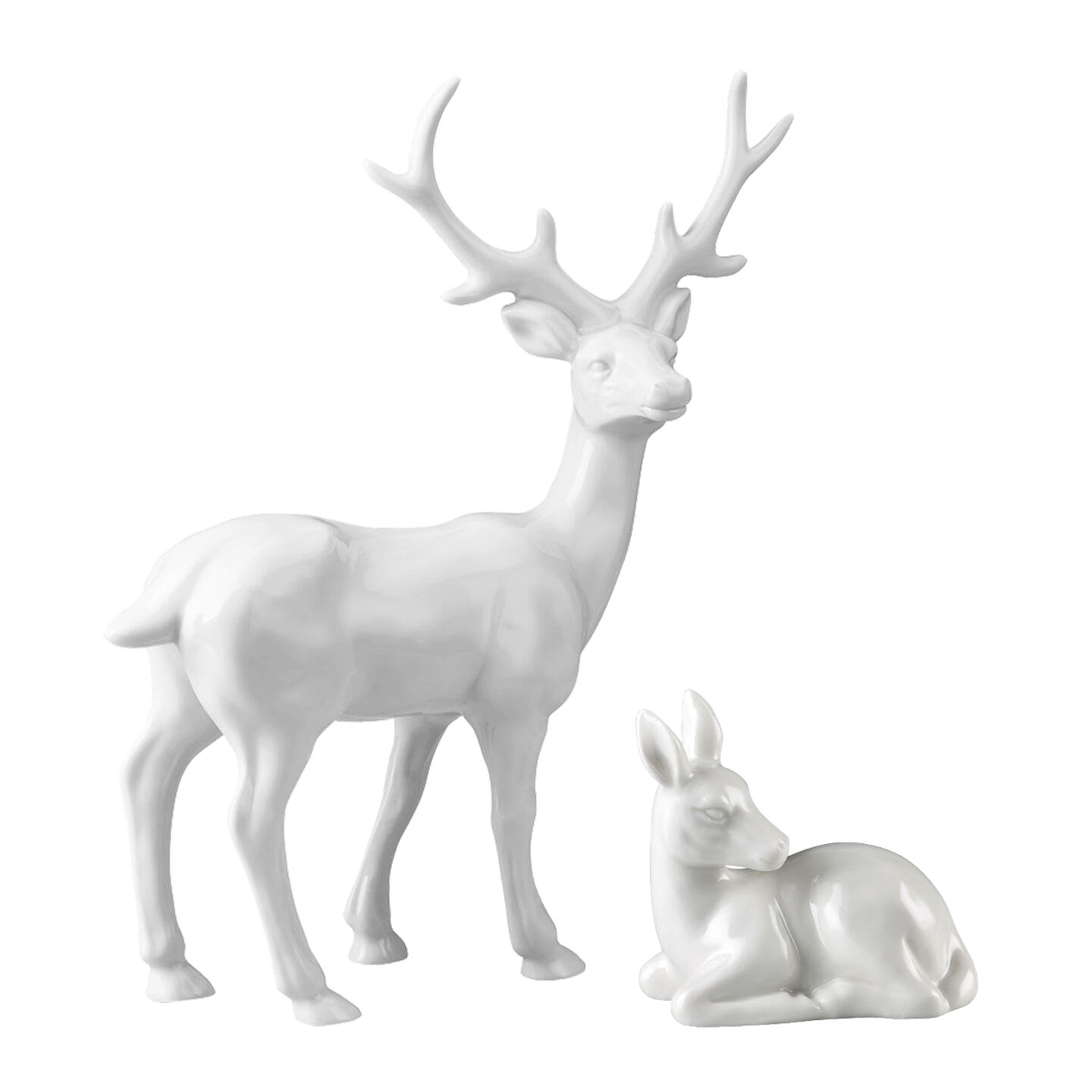 White Hutschenreuther porcelain figurines: standing stag and resting deer.