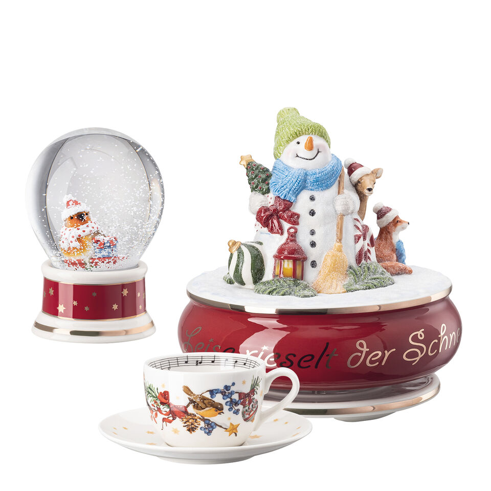 Hutschenreuther snow globe, music box and cup with saucer from Hutschenreuther Christmas Collection on white background